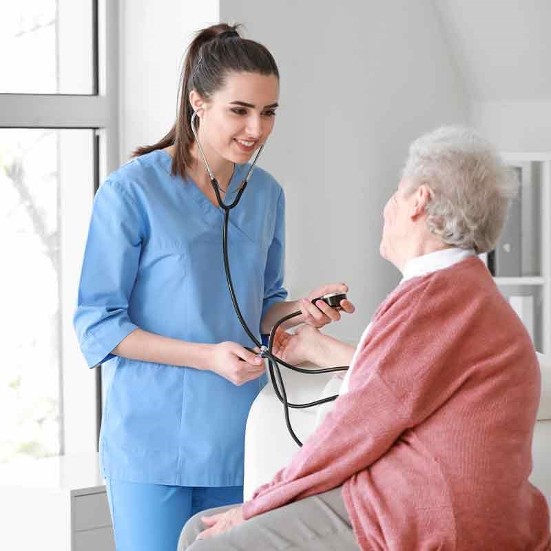 Nurse assessing patient.